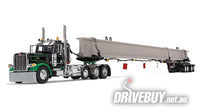 DCP by First Gear Black/Green Peterbilt Model 389 Truck w/ 4-Axle Hydra-Steer Trailer With Bridge Beam Section 1/64