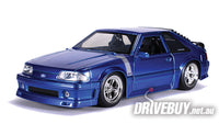 
              Jada Big Time Muscle 1989 Ford Mustang GT in Electric Blue 1/24
            