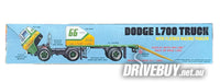 
              Dodge L700 Truck with Flatbed Racing Trailer 1/25 - AMT Model Kit
            