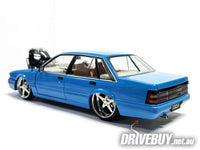 
              1986–1988 Holden VL Commodore Calais Custom Supercharged 1/24 – DDA Collectibles – Blue
            