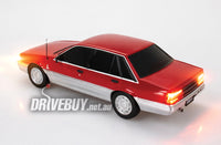 
              Holden VL Calais Sedan 1/24 - DDA Spectra Rides Light Up - Red Silver
            