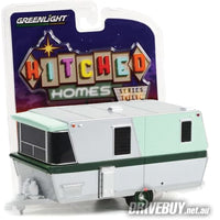 
              1962 Holiday House Travel Trailer Caravan 1/64 – GreenLight Diecast – Mint/Silver
            