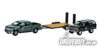 
              2018 Ford F150 Yellowstone with 1992 Ford Bronco & Trailer 1/64 – GreenLight – Grey/Black
            