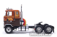
              1976 Ford CL9000 COE Semi Truck 1/64 - IXO Diecast - Brown Tan Gold
            