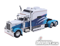 
              2002 Peterbilt 379 Sleeper Cab Semi Truck 1/64 – IXO – Blue and White
            