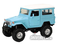 
              Toyota Land Cruiser FJ40 1/24 - New Ray Diecast - Blue
            