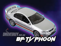 
              Ford BF Falcon Typhoon 1/64 – OzWheels FSD S3 – Silver with Orange Stripes
            